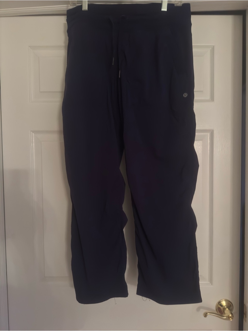 2 pairs size 10 Lululemon drawstring pants. 1 Navy Blue and 1 Black selling both